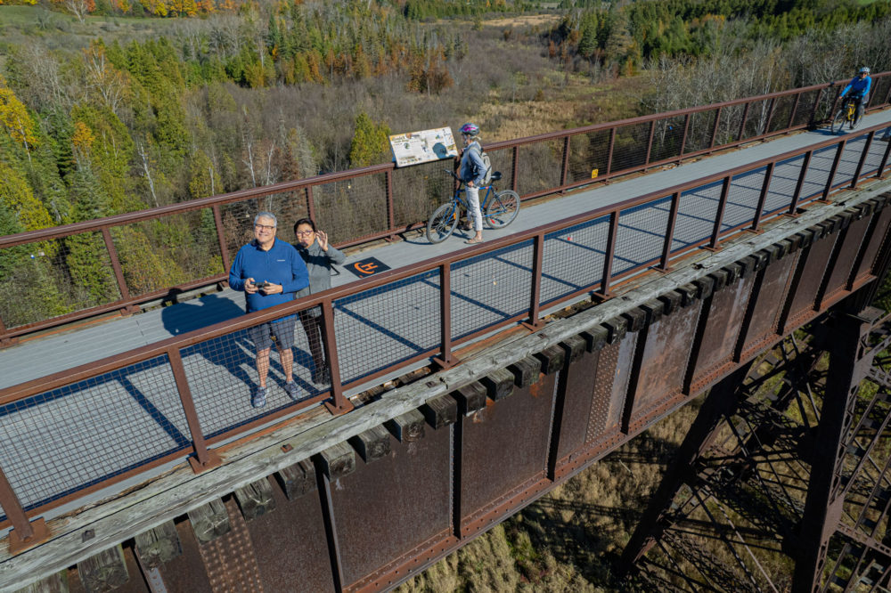 Man and woman on Doube's trestle bridge